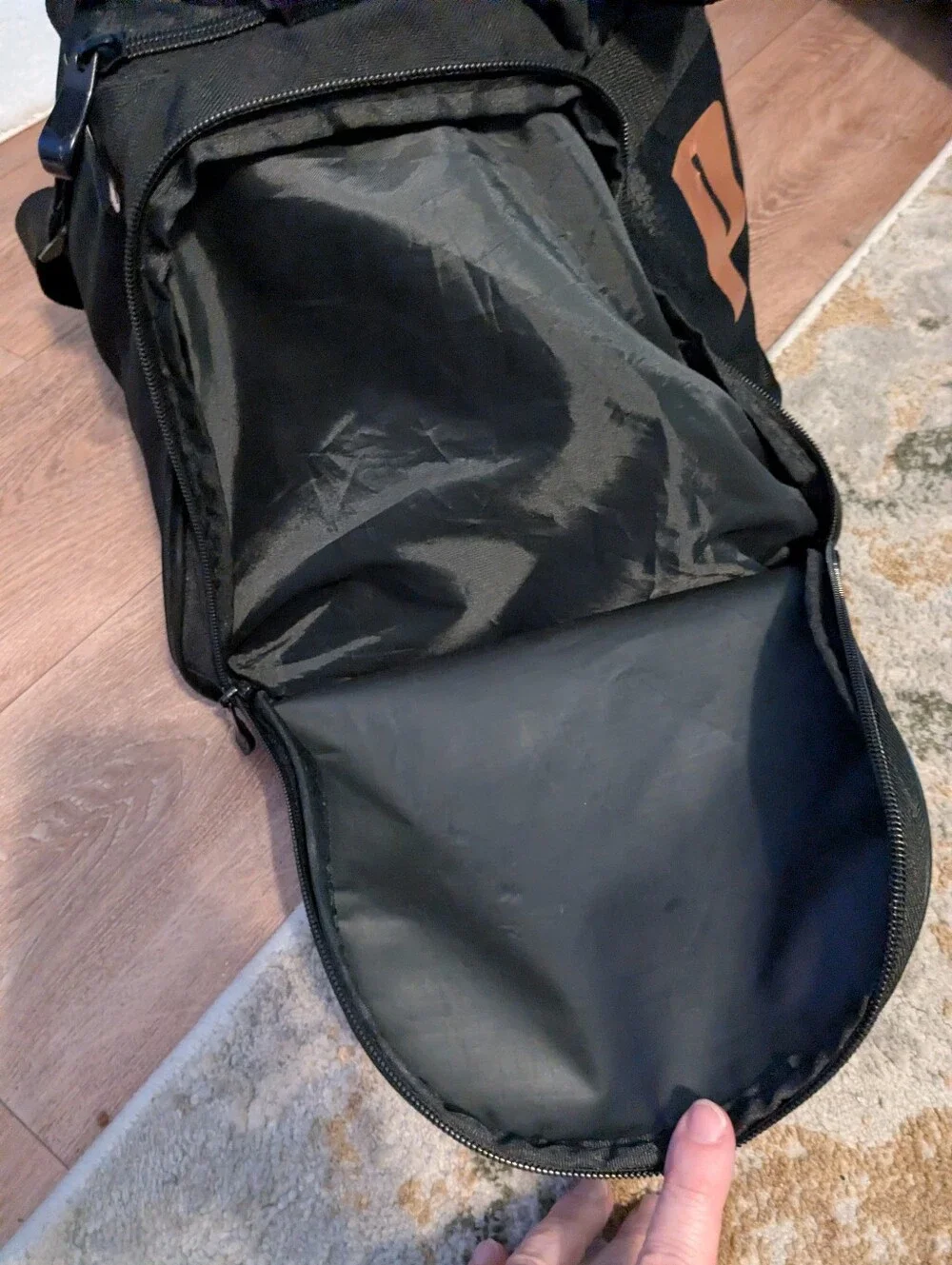 Puma Black Duffel Bag with Metallic Copper Logo